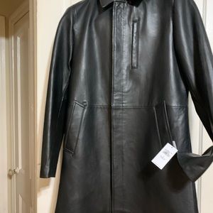 Women new with tags genuine knee length leather coat fully lined with pockets